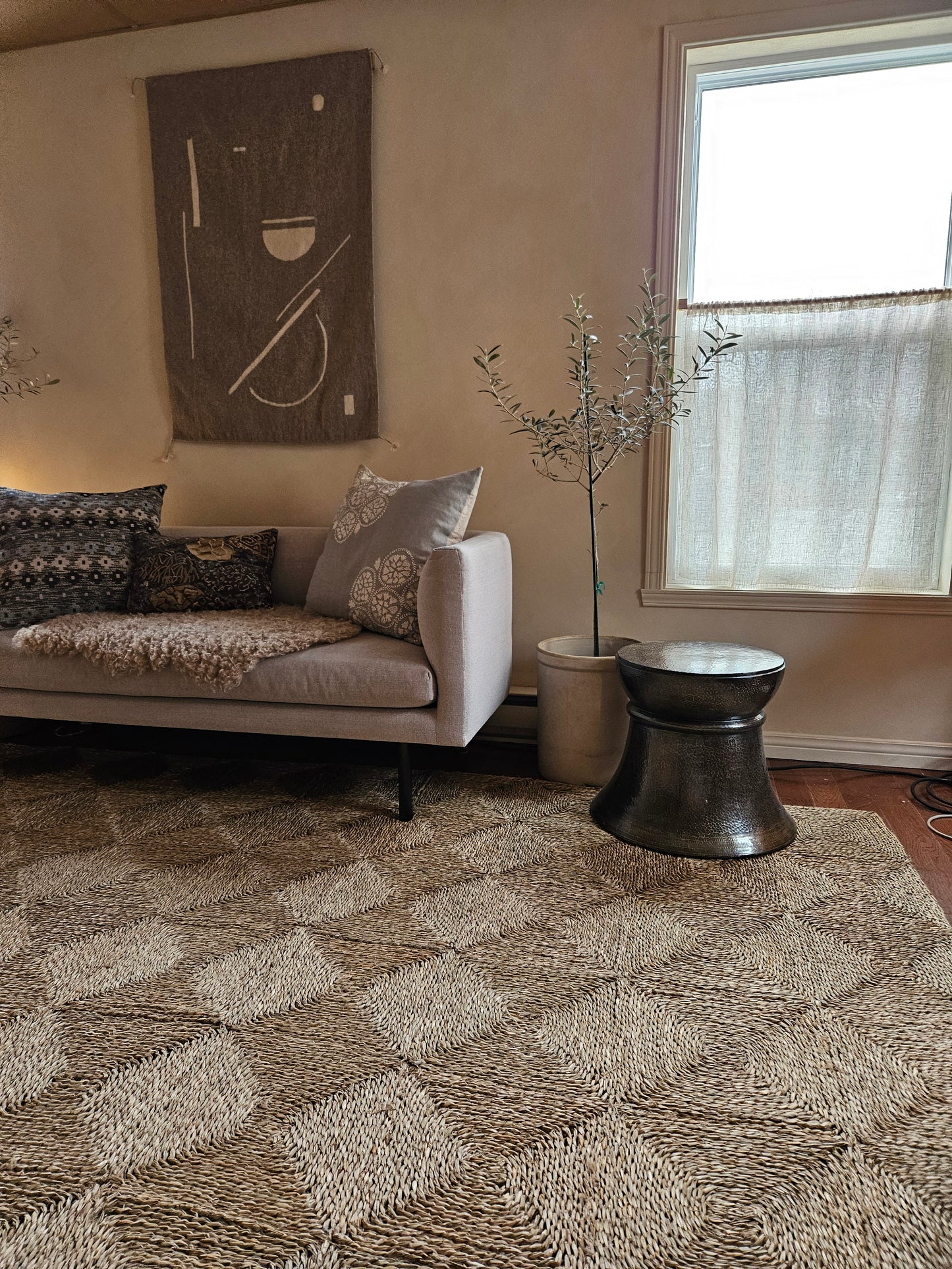 Hammered bronze side table