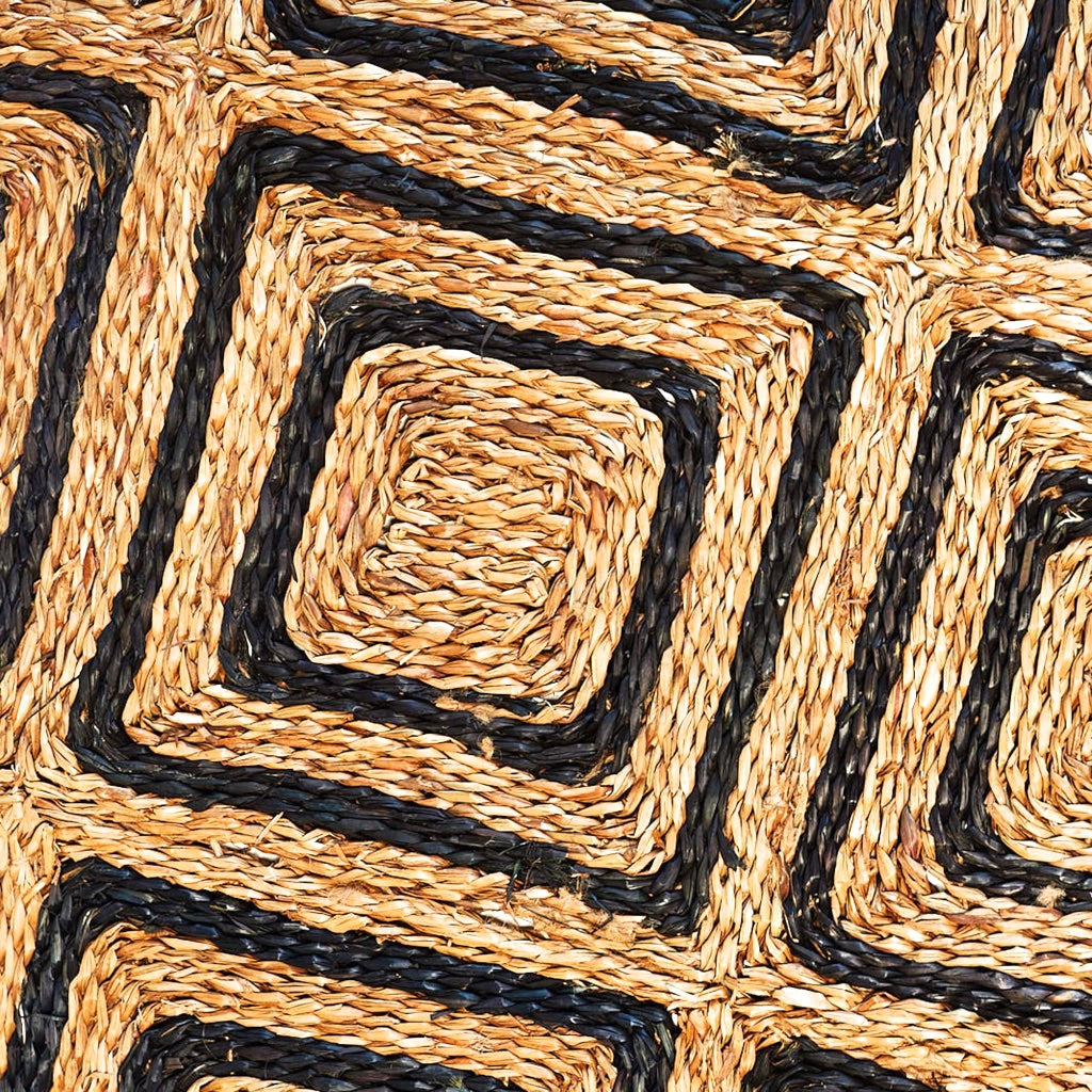 Dark tone geometric Seagrass rug